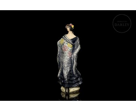Ceramic figure. Depicts a beautiful lady with flowers in her hair, draped in a manila shawl.  Signed and dated ‘A. Peyro/1997