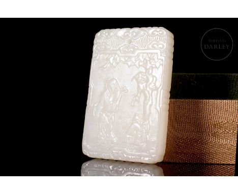 Jade of an elegant milky-white colour, carved in the form of a fine traditional plaque. It has a rectangular profile with a t