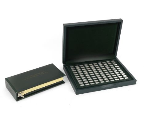 A cased set of 100 miniature sterling silver ingots by John Pinches, 1975,dark green leather case with lid, opening to velour