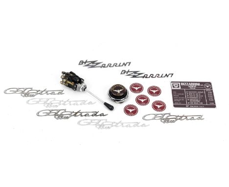 Bizzarrini spares and badges,comprising a combination indicator stalk and light switch, a steering wheel central boss horn-pu