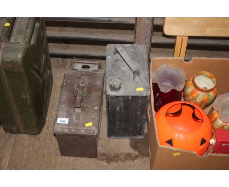A metal ammo box and a vintage petrol can