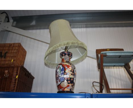 An oriental table lamp and shade