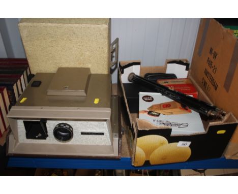 A box containing a projector; tripod; box camera, an Argus 500 projector with carrying case&nbsp; etc.