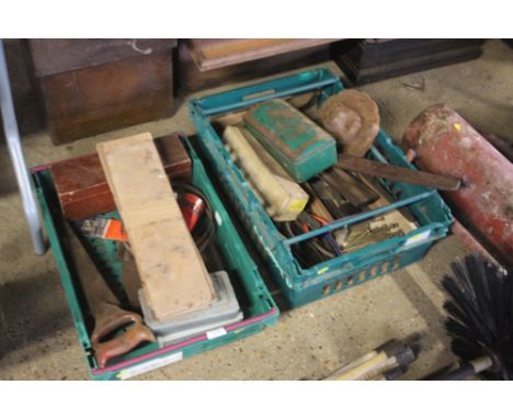 Two plastic trays and contents of various hand tools; lion mask feature etc.