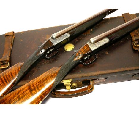 Trulock and Harriss cased pair of 12 bore side by side shotguns, serial numbers 10991 and 10992, 30inch browned Damascus barr