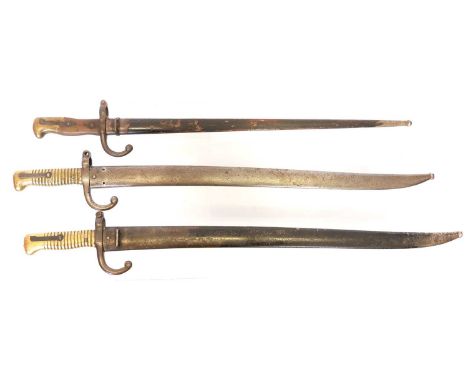 Two M.1866 Chassepot rifle bayonets and scabbards, also a M.1874 Gras rifle bayonet and scabbard. THIS LOT CANNOT BE POSTED. 
