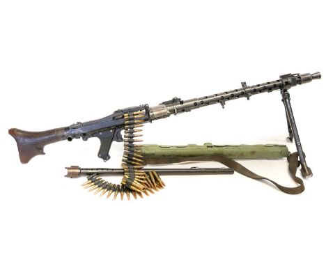 Deactivated German WWII MG34 7.92mm belt fed machine gun, serial number 7858, the removable butt numbered 8547, 28 inch barre