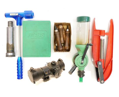 Reloading tools, including a Redding powder dispenser, Lee hand-held press, bullet pulling hammer, RCBS Lube die, and five pr