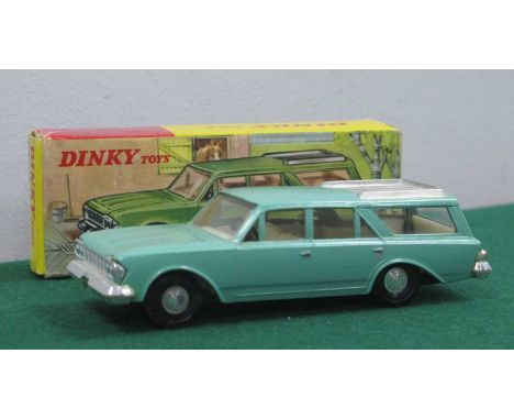 Original Hong Kong Dinky 57/006 Rambler Classic, light green/silver roof rack, excellent boxed.