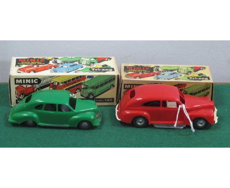 Two Plastic Clockwork Minic Cars, a Ford Tudor in red, and Jowett Javelin in green, both very good, both boxed, two keys.