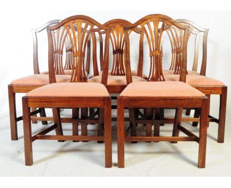 A set of eight 19th century Regency revival mahogany dining chairs. Chippendale manner mahogany dining chairs being raised on