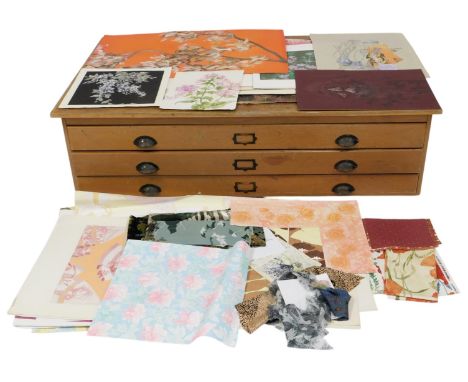An oak three drawer partial plan chest, each drawer containing botanical related artist's prints, watercolours, etc., 40cm hi