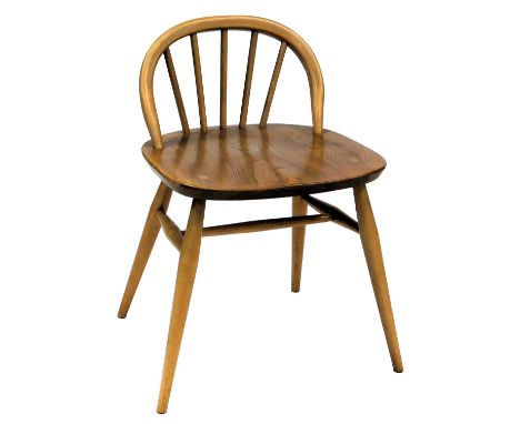 An Ercol light elm dressing table chair, bears label.