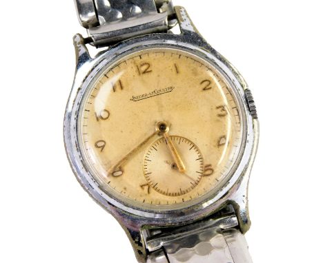 A Jaeger-LeCoultre chrome plated cased wristwatch, circular champagne dial bearing Arabic numerals, subsidiary seconds dial, 