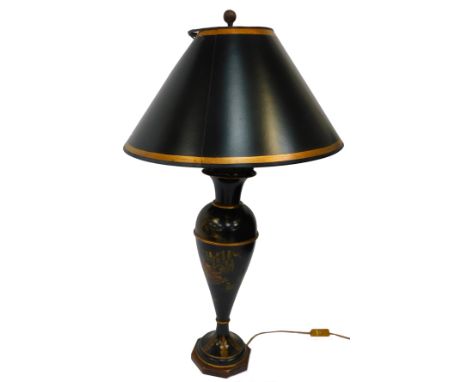 A 20thC chinoisserie toleware table lamp, of cylindrical tapering form with a flared neck, decorated with buildings amongst w
