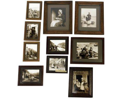 A group of late 19th/early 20thC photographs, of figures in a seaside setting, to include fishermen, children playing on the 
