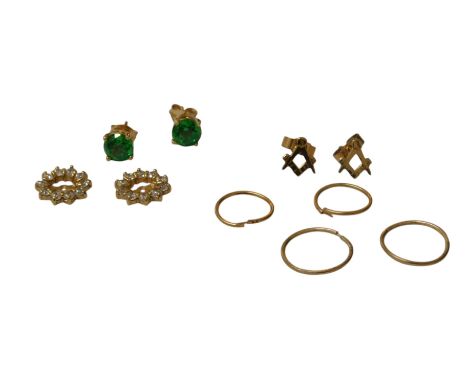 A group of earrings, to include a pair of Masonic stud earrings, two pairs of hoop earrings, and a pair of green stone studs,