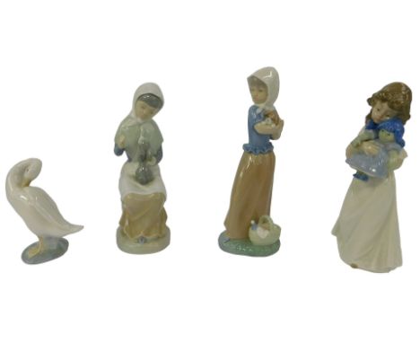 Three Nao porcelain figures, modelled as a girl holding a puppy, 12cm high, a girl holding a doll, 11cm high, and a girl seat