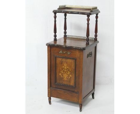 Victorian walnut and inlaid purdonium, the top shelf with a brass rail over a pull out coal scuttle base with an inlaid reces