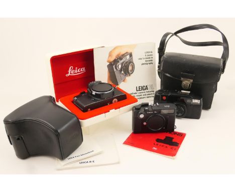 Leica CL camera body, no. 1316394, within a black leather carrying case; also a Leica C2-Zoom; and a Leica R-E camera, body o