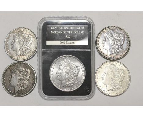 Five USA Morgan dollars comprising 1889 (UNC), two 1882, 1887 and 1902 (VF/EF), gross weight approx. 134g 