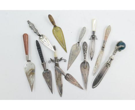 Small collection of silver trowel and other bookmarkers including two of sword form, each with mother of pearl handle, Birmin
