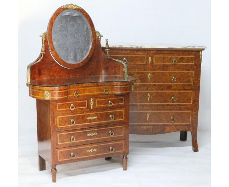 French amboyna chest of drawers, early to mid 20th Century, having a white marble top over two short and three long drawers, 