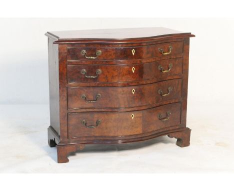 Burr walnut serpentine front chest of drawers, in the Georgian style, well figured top over four long graduated drawers with 