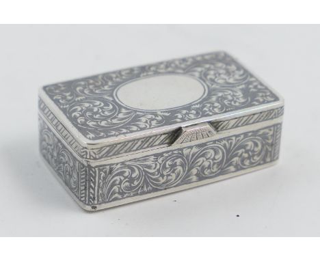 Russian niello silver snuff box, probably Nicholai Alexeyev, Moscow, circa 1908-26, rectangular form worked with scrolled fol