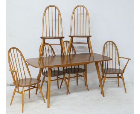 Ercol light elm and beech dining suite comprising dining table, 152cm x 77cm and six (4+2) hoop back dining chairs, height 98