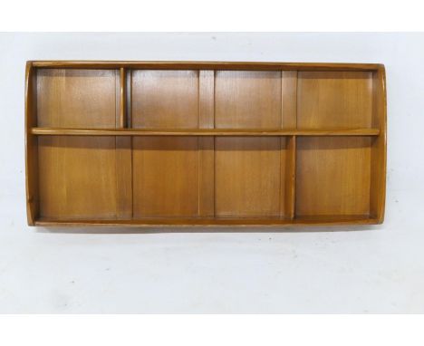 Ercol light elm display shelf, having two grooved shelves against a panel back, width 107cm, height 49cm 