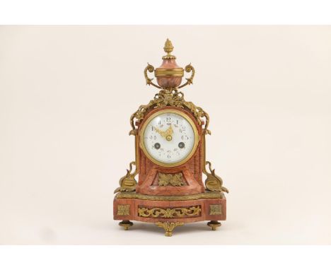 French scagliola and ormolu mantel clock, circa 1890, by AD. Mougin, the clock surmounted with an urn finial and a ribbon gar