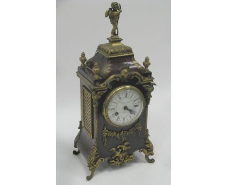 A Late XIX Century French Tortoiseshell and Gilt Metal Mantel Clock, cast with floral swags and birds, the white dial with Ro