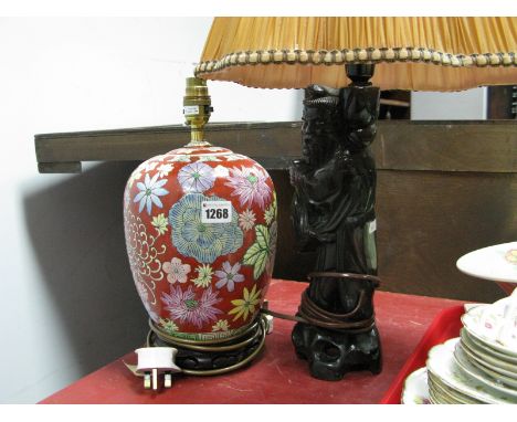 Oriental Hardwood Figure, (converted into a table lamp) together with a Chinese table lamp on a hardwood stand (2)