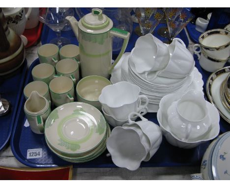 A Royal Doulton Art Deco 'Athlone' Pattern Coffee Service, number D.5552 (fifteen pieces) and a Shelley tea set on a plain wh