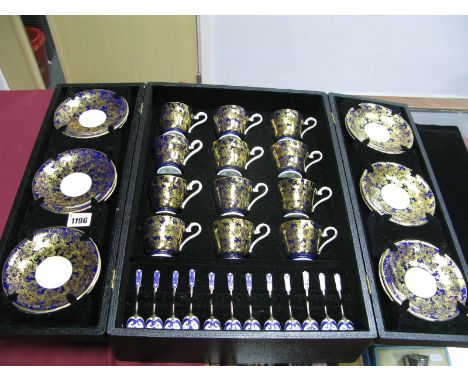 An Aynsley Porcelain 1950's Coffee Service, the dark blue grounds with elaborate gilt floral decoration, comprising:- twelve 