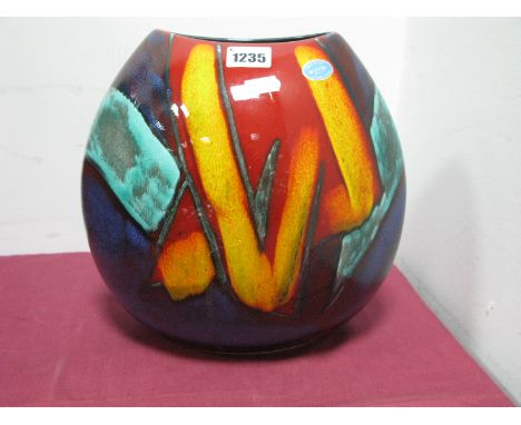 A Poole Pottery 'Graffiti Purse' Vase,  with yellow abstract design on red ground 24.5cm high.