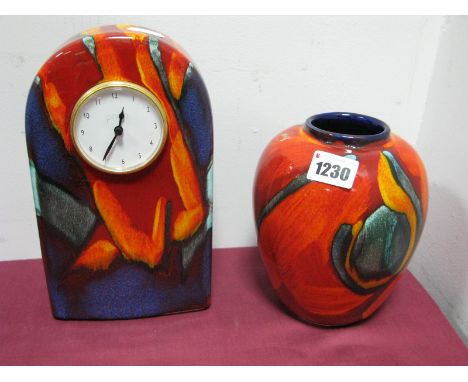 A Poole Pottery Graffiti Style Abstract Dome Cased Clock, 22cm high, Peacock Ginger vase 15.5cm high. (2)