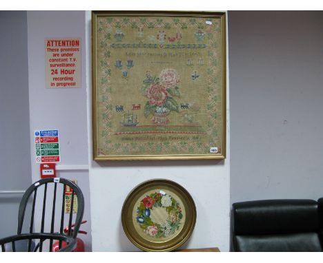 A Mid XIX Century Woolwork Sampler, worked by Amas Ratcliffe and dated 1846, with inscription 'Love Your Enemies' a central b
