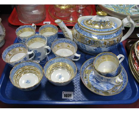 A Collection of Miles Mason Teawares, decorated in blue with the Willow pattern within gilt fruiting vine borders, comprising