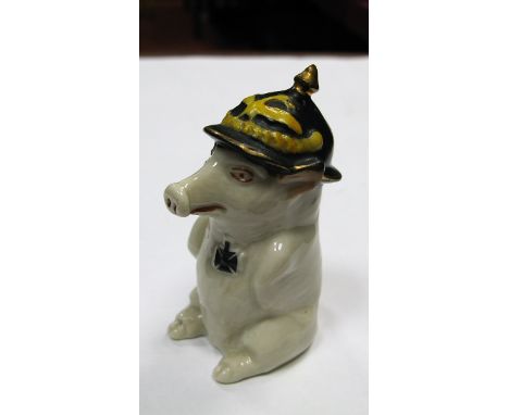 A WWI Era W & R Carlton China Pig, seated and wearing a German Pickelhaube and Iron Cross on left breast, Reg. No. 642626, 9c