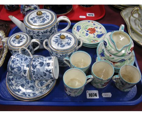 A Gray's Pottery Part Coffee Service, painted in green, iron red and blue with stylised tulips and other spring flowers, prin