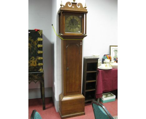 An XVIII Century Oak Eight Day Movement Grandfather Clock, Thos Oage Norwich, the hood with a swan neck pediment, brass finia