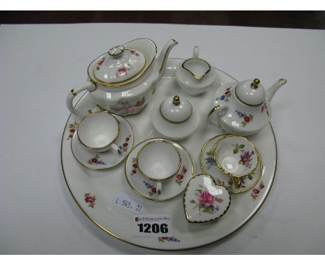 A Caverswall Trinket Set, Derby Posies teapot, Coalport heart box