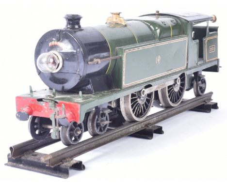 Model Railway - a vintage Hornby O gauge tinplate electric locomotive engine. The loco being a 4-4-2 GWR Great Western Railwa