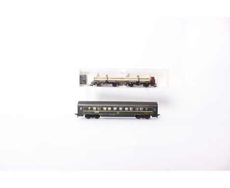 A Fleischmann HO 3527 pipe transport wagon in Perspex case together with a a passenger carriage. 