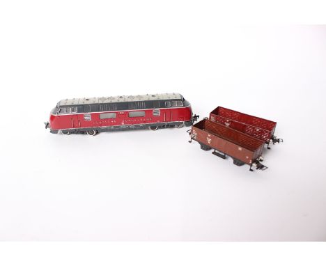 A Fleischmann (H0 scale) 1381 DB Railways diesel V200035 (unboxed) together with two unboxed Fleischmann transport wagons. 