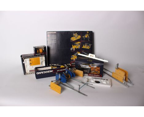 A collection of boxed and loose Meccano to include a boxed steam engine, an electronic conversion kit and a 395 set for all a