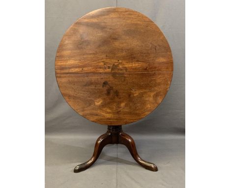 19TH CENTURY MAHOGANY TILT-TOP TRIPOD TABLE, 82.5cms diameter top on a bulbous turned column and three substantial feet, 72cm