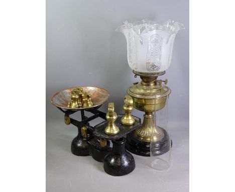 BRASS OIL LAMP with an etched glass shade and vintage scales with brass weights